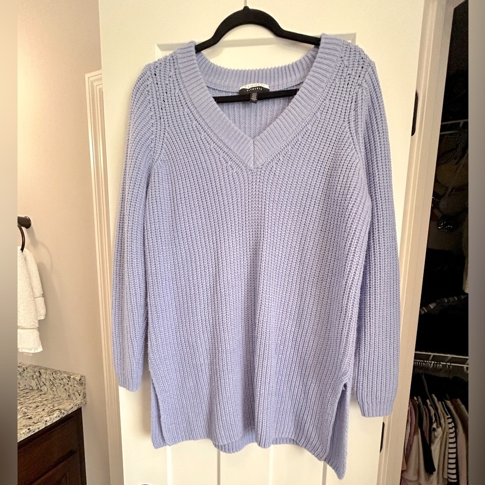 Eloquii sweater in a darling dusty blue color.